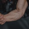 Detailed image of a flexed arm showing prominent veins and muscular definition.