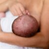 Tender moment of a mother breastfeeding her newborn, highlighting love and bonding.