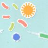Paper cutout types of various contagious viruses and syringe with medical remedy for preventing spreading of disease on blue background