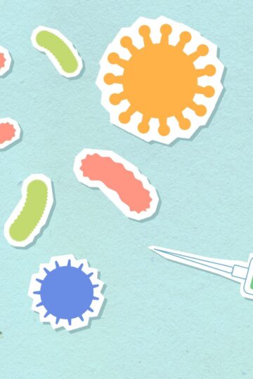Paper cutout types of various contagious viruses and syringe with medical remedy for preventing spreading of disease on blue background